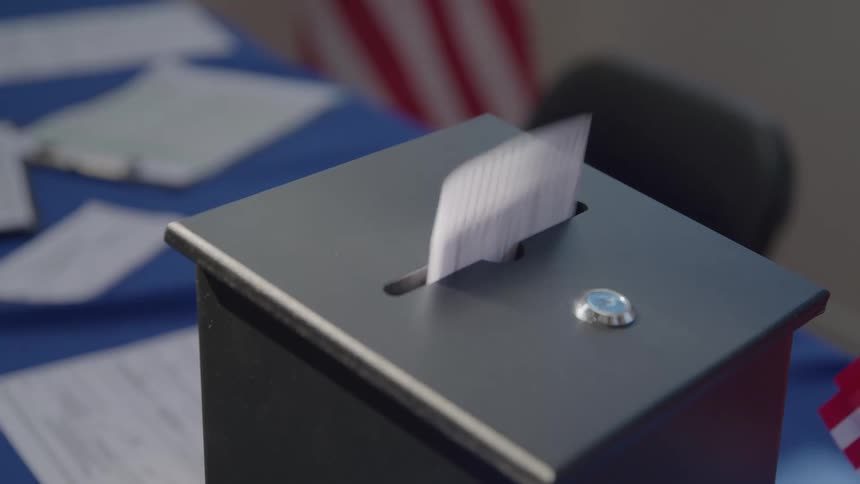 A ballot is placed in the black box