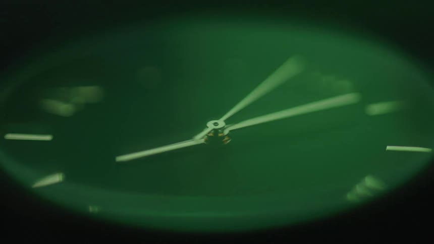 Lights are flashing on the spinning watch dial