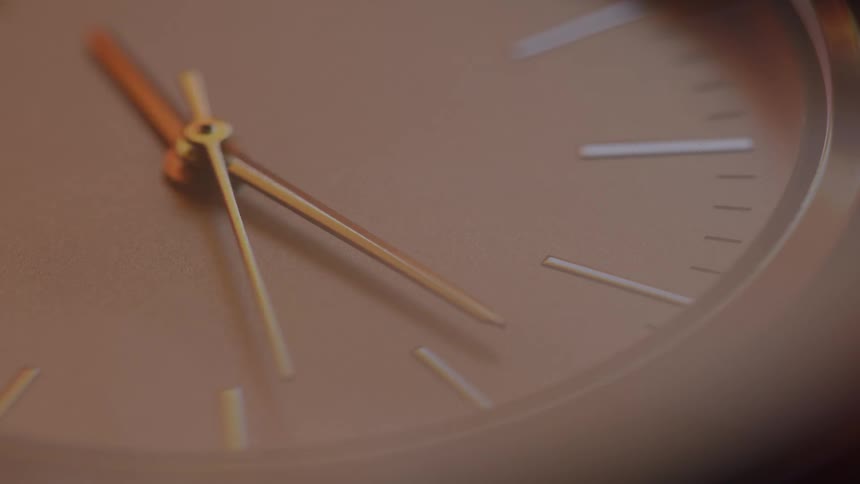 The hands on the watch turn fast around the dial