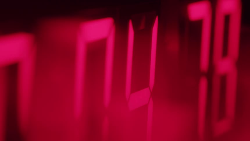 A digital clock counts down from ten to zero
