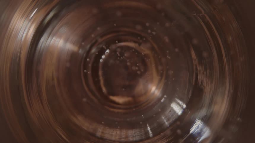 Inside view of a transparent glass with small air bubbles