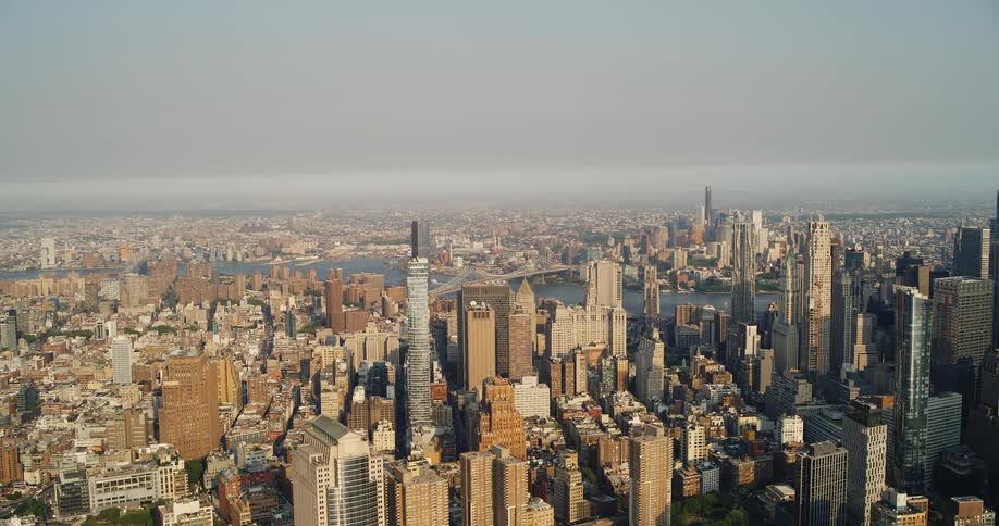 Panoramic view of new york highlights skyscrapers and bridges over the river
