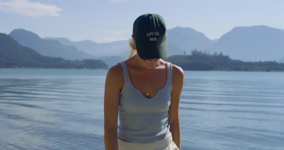 A woman hikes near a body of water