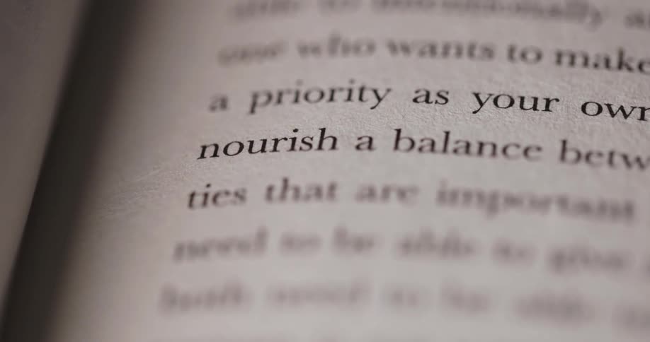 The video shows two lines of text from a book the first line is especially when and the second line is nourish a balance betw