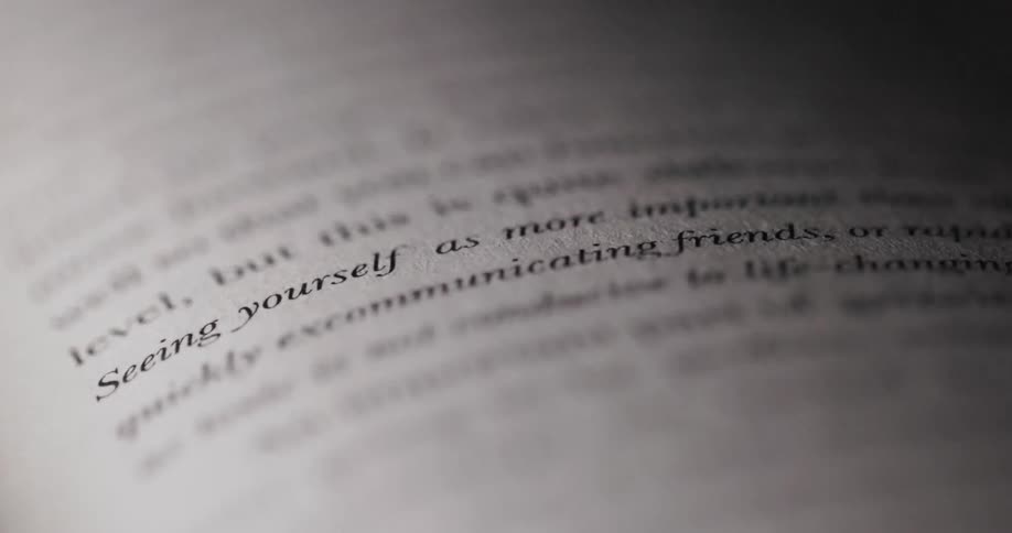 Close up of a various lines of text on a book page