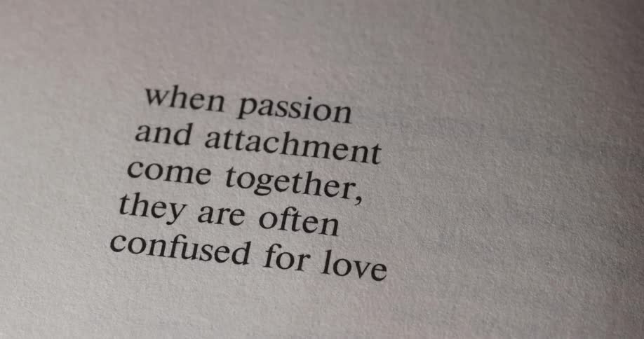 The video shows a page from a book with a short quote on it the quote reads when passion and attachment come together they are often confused for love