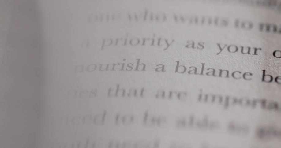 The video shows two lines of text from a book the first line is especially when and the second is a priority as your own