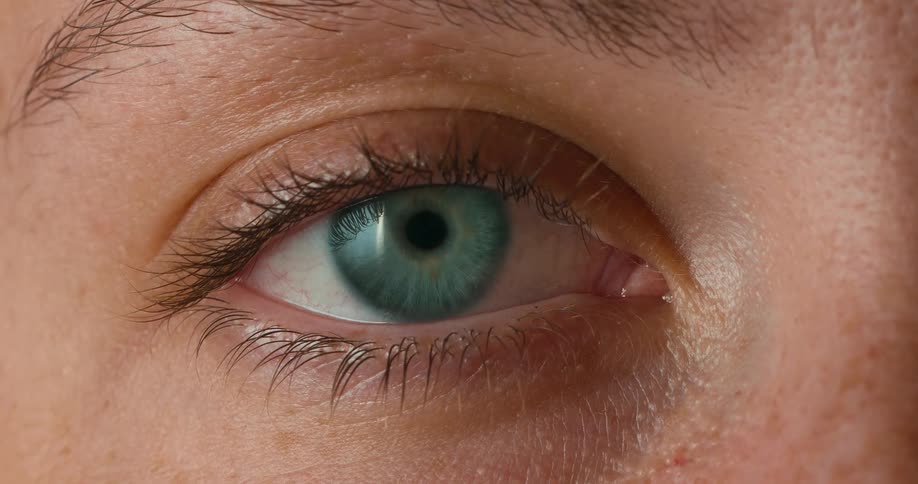 The person blinks their eye