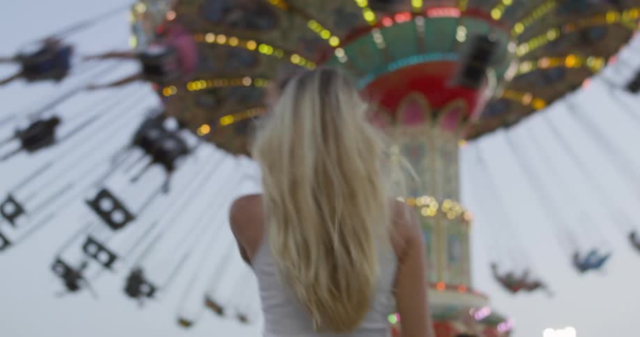 The woman is having fun at the carnival