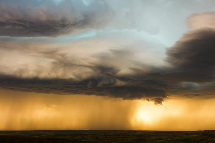 Time lapse of storm clouds and lightening over the horizon during a thunderstorm