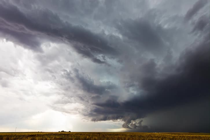 A time lapse of large gray storm clouds passing overhead