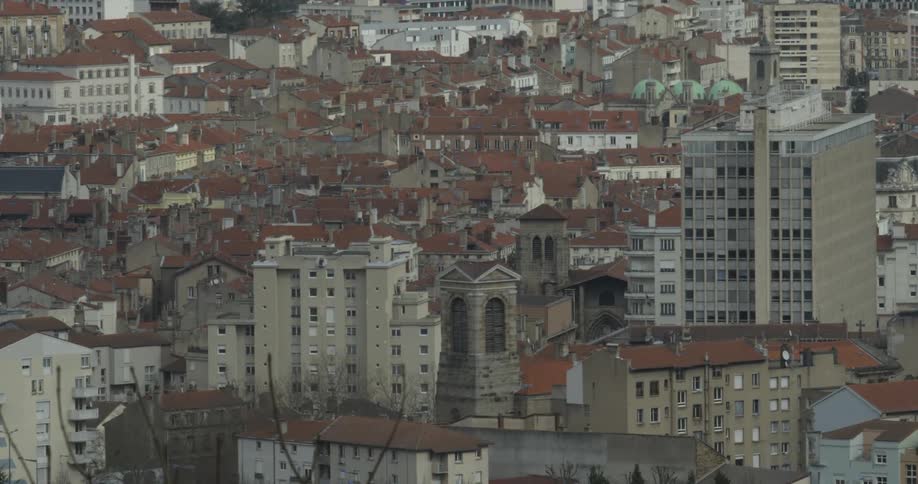 City buildings are shown in the distance