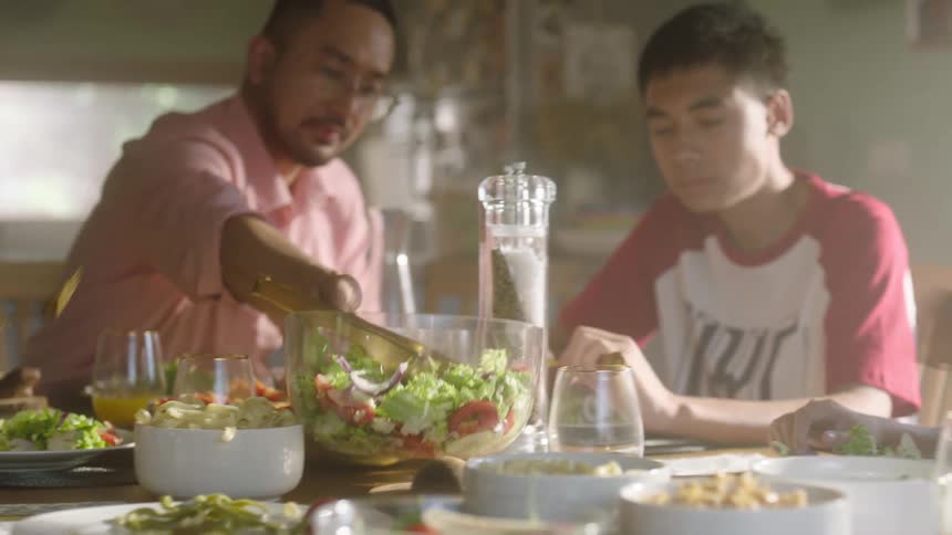 The family have a meal together