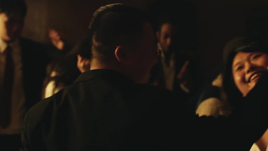 People are dancing and smiling in the club together