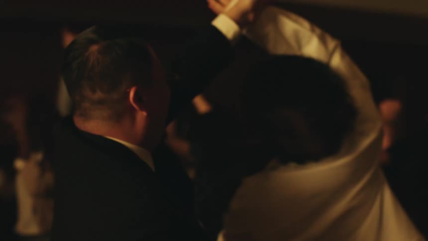 People are dancing and having fun in the full nightclub