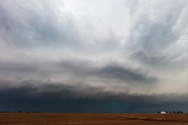 Heavy storm clouds pour rain all over