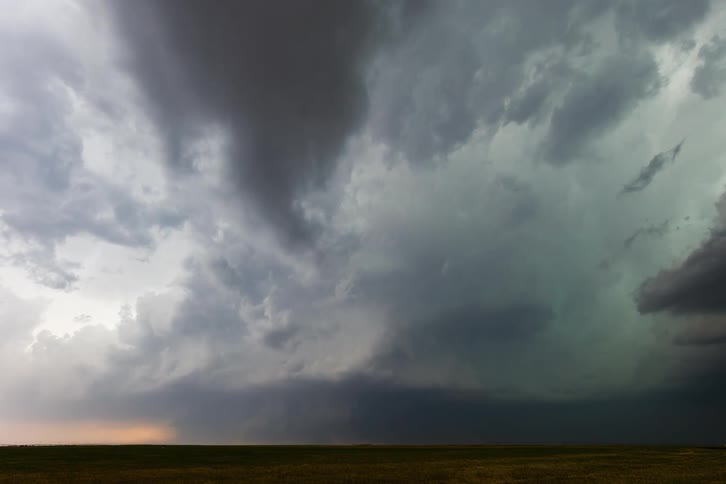 The clouds spin and lightning flashes during a storm