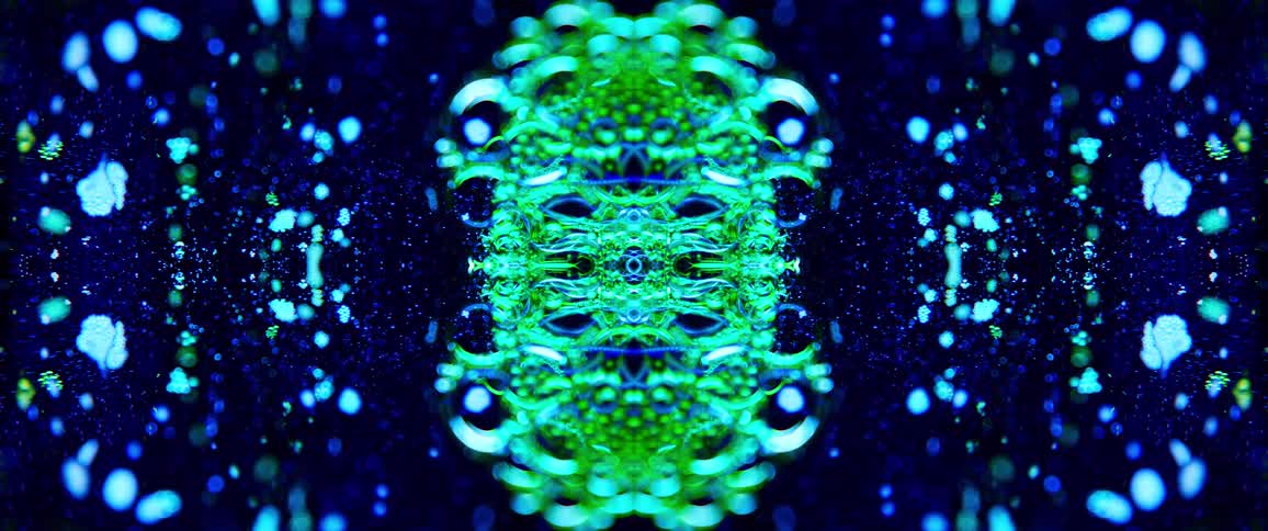 The bubbles move around the green color in the artwork