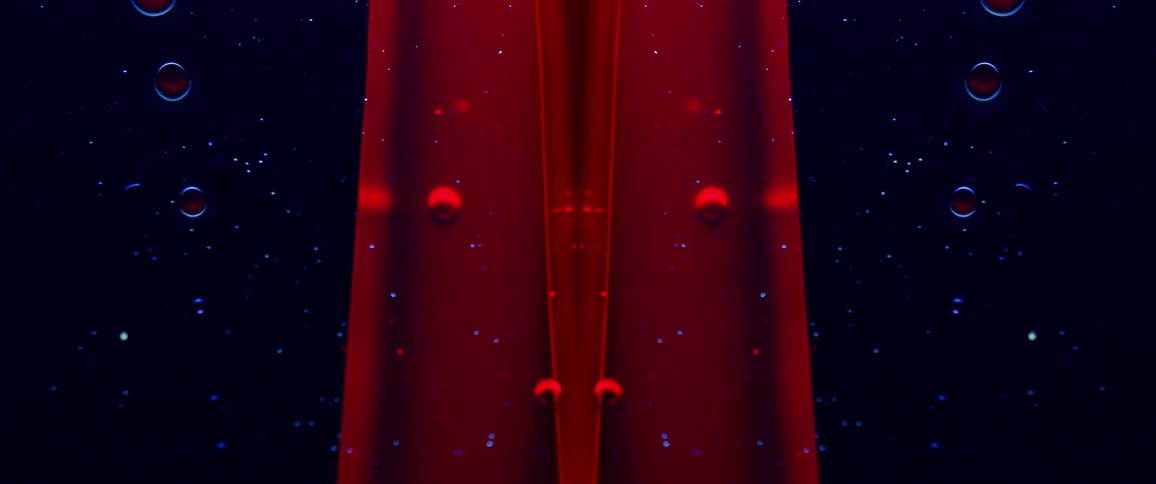 The red liquid flows over the stars in the screensaver