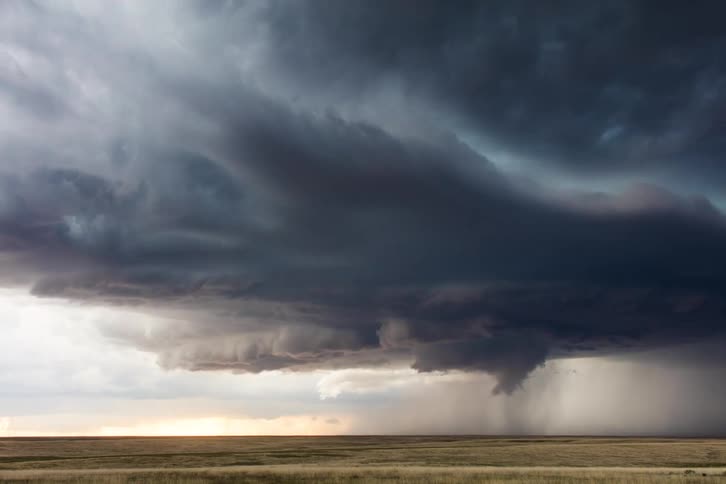 A storm cloud rolls in bringing rain