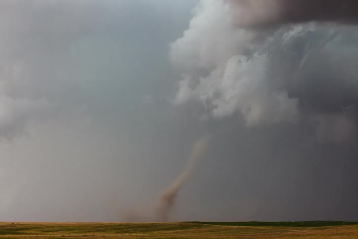 The tornado is moving on the field