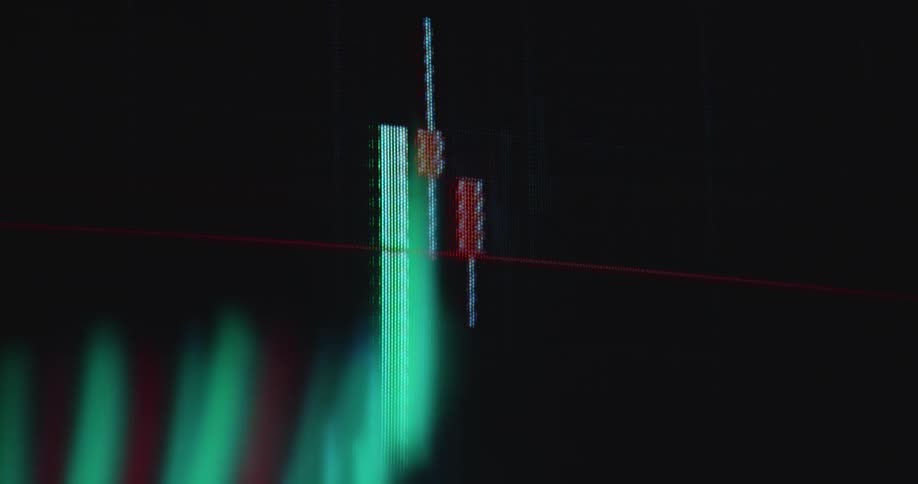 Extreme macro close-up of a pixelated candle of candlestick trading chart changing between the colors green and red as symbol for volatility and uncertainty in the financial markets while the price of the stock or cryptocurrency rises and falls