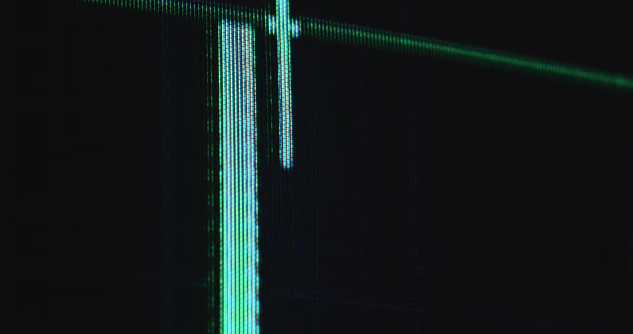 Extreme macro close up of green and red candles with long wicks of user interface of trading application show the price of a stock or crypto currency going down with a negative trend symbolizing volatility and price action or movement