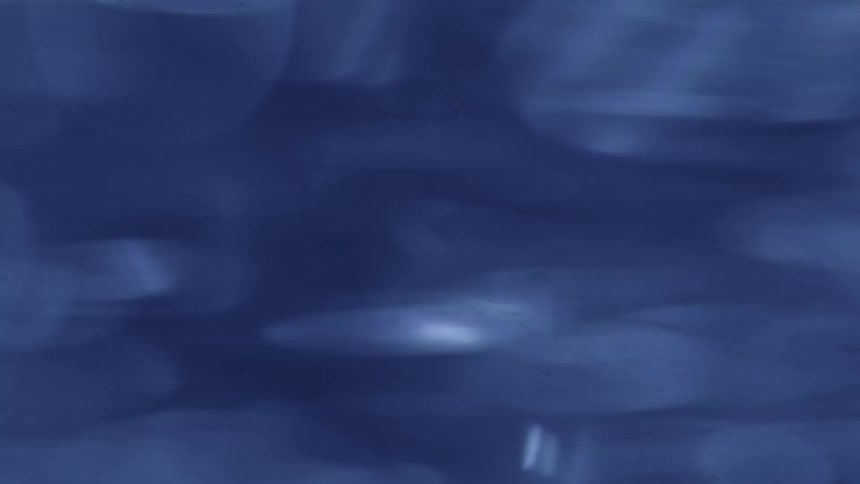 Bluish tones show circular reflections of rotating water movement