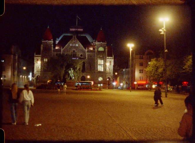 Tourists travel in the city at night