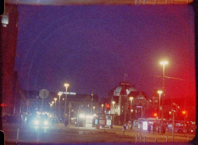 Pedestrians and buses travel in the city