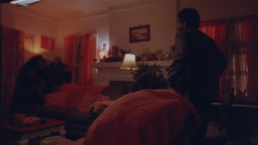 The man and woman enter the home while talking