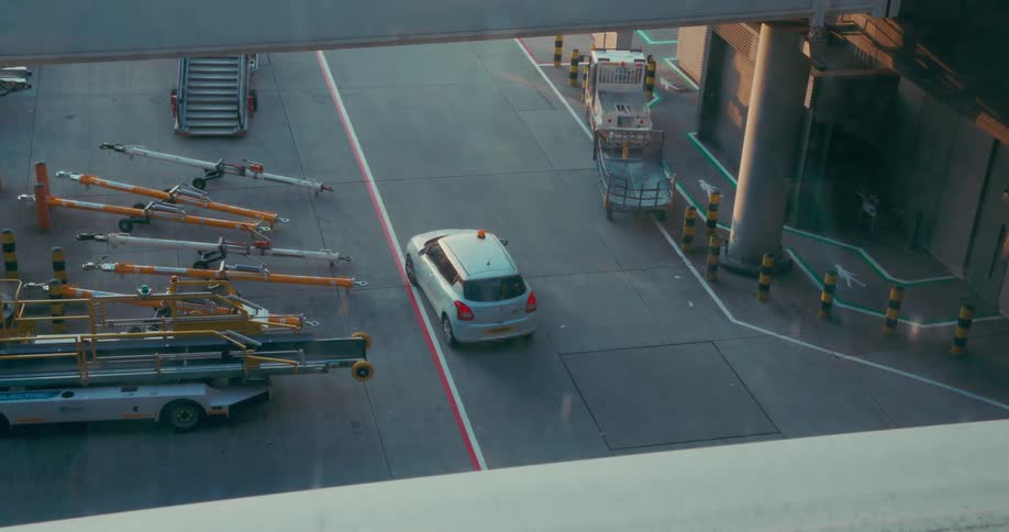 Car parked inside an airport outdoors during day time