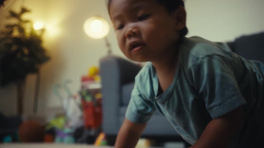 Children play together in the living room
