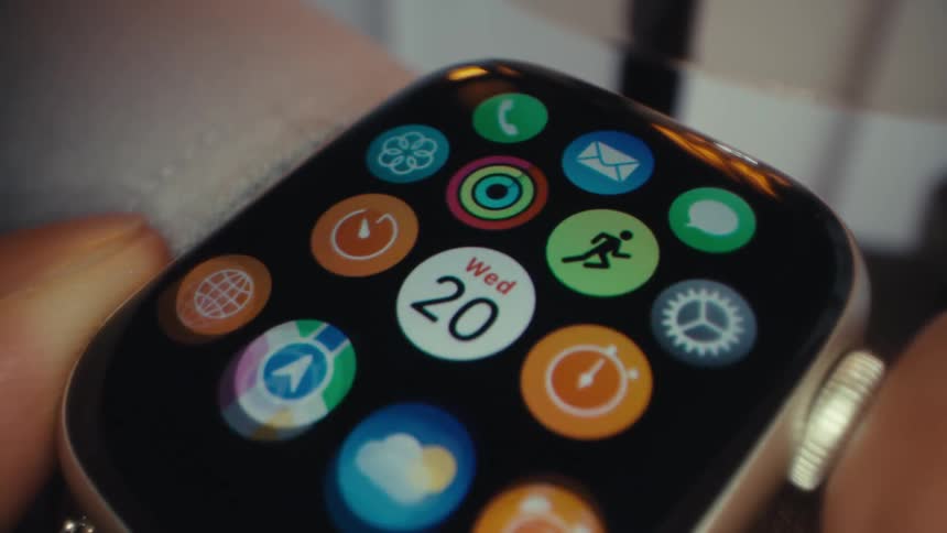Finger interacting with smartwatch