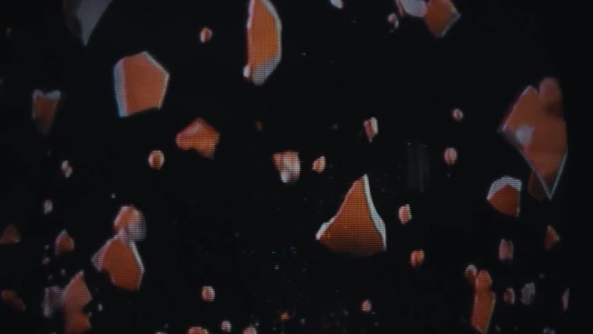An animation of a piggy bank exploding appears on the television