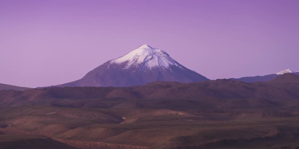 Snow is at the peak of the mountain ahead