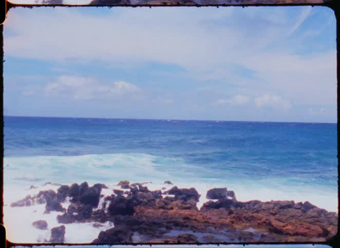 Ocean landscape with waves crashing on the rocky shore
