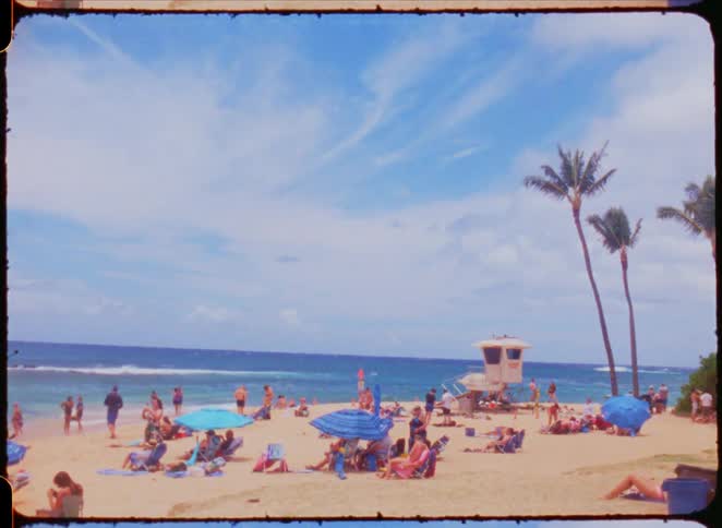 A large crowd fills the beach