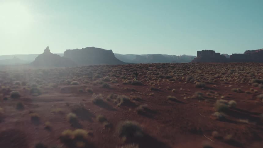 The man is running in the desert