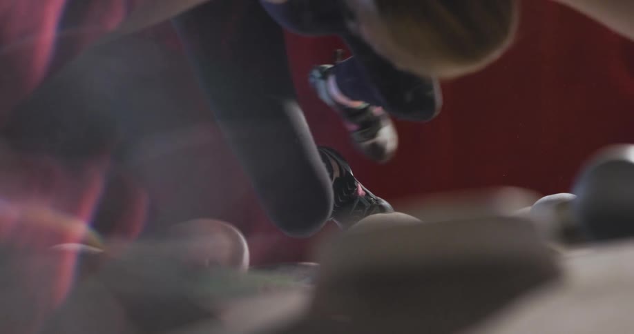 Person climbing a training wall