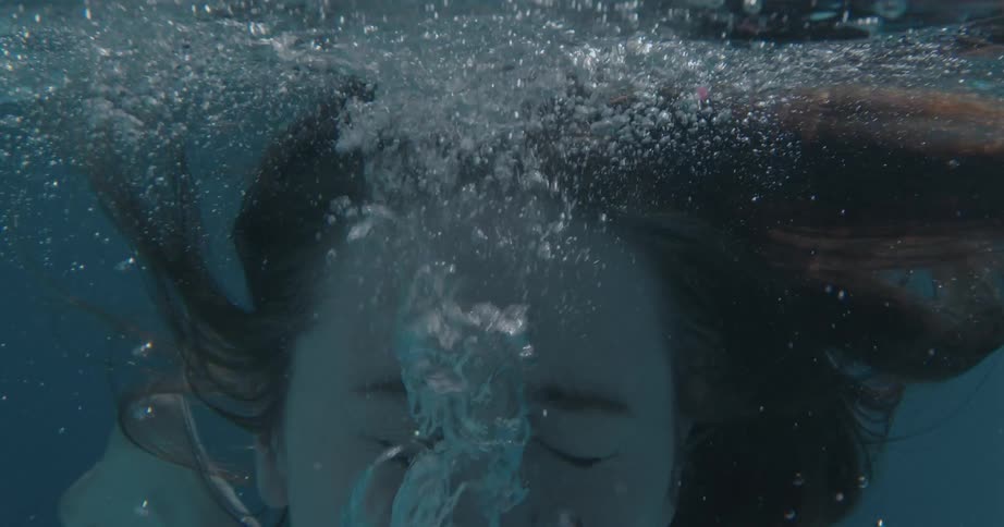Woman diving into a pool