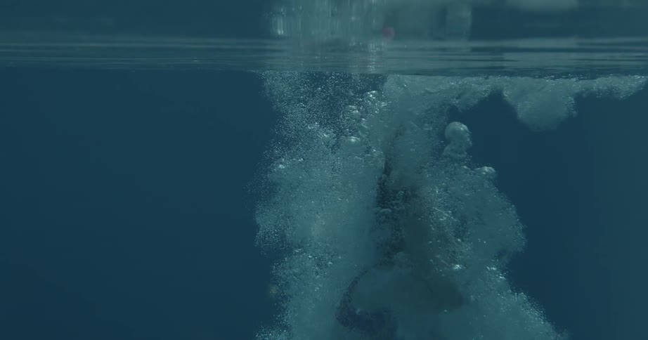 Woman diving into the pool