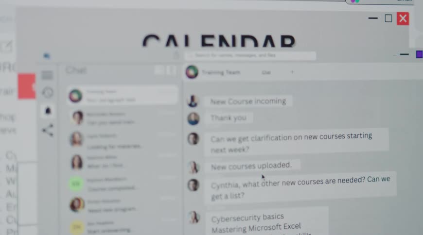 Computer screen shows a training team chat discussing new courses