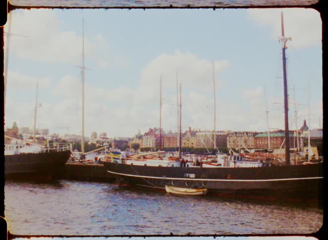 The boats are docked in the harbor