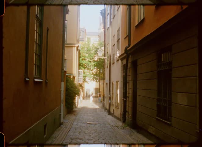 People walk in the city on a sunny day
