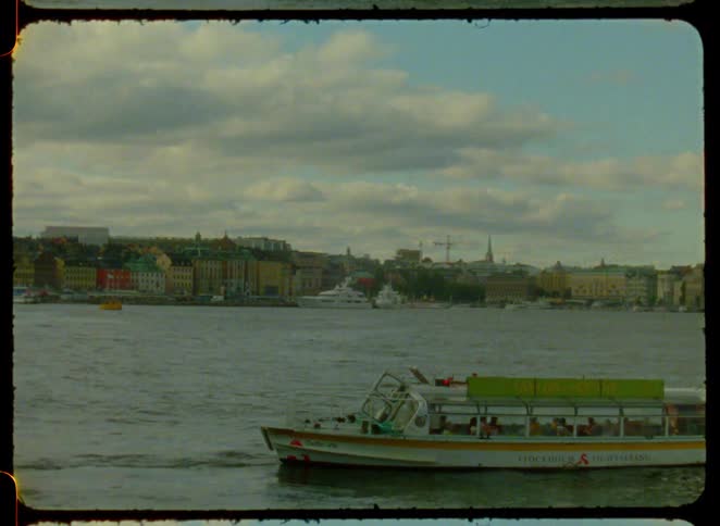 The ferry passes the city