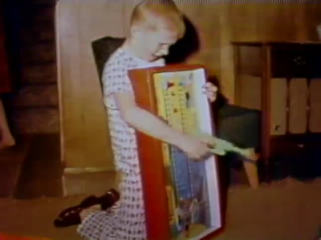 A child is playing with his toys