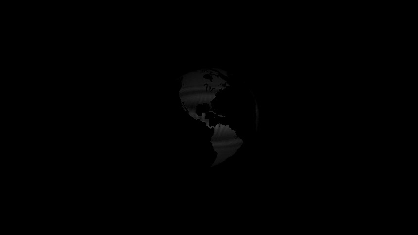 A spinning globe in darkness