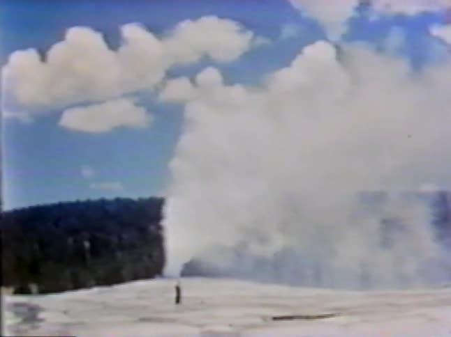 Water spewing from a natural geyser