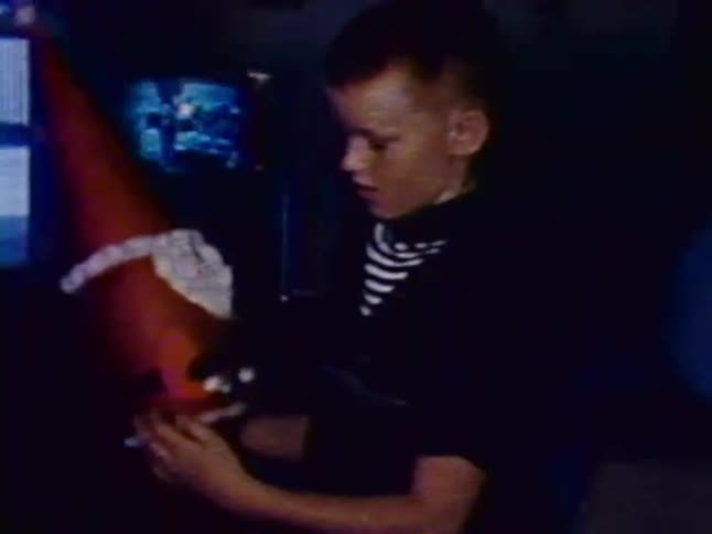 A child picks up a toy santa
